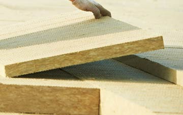 measuring Brown Street tapered insulation